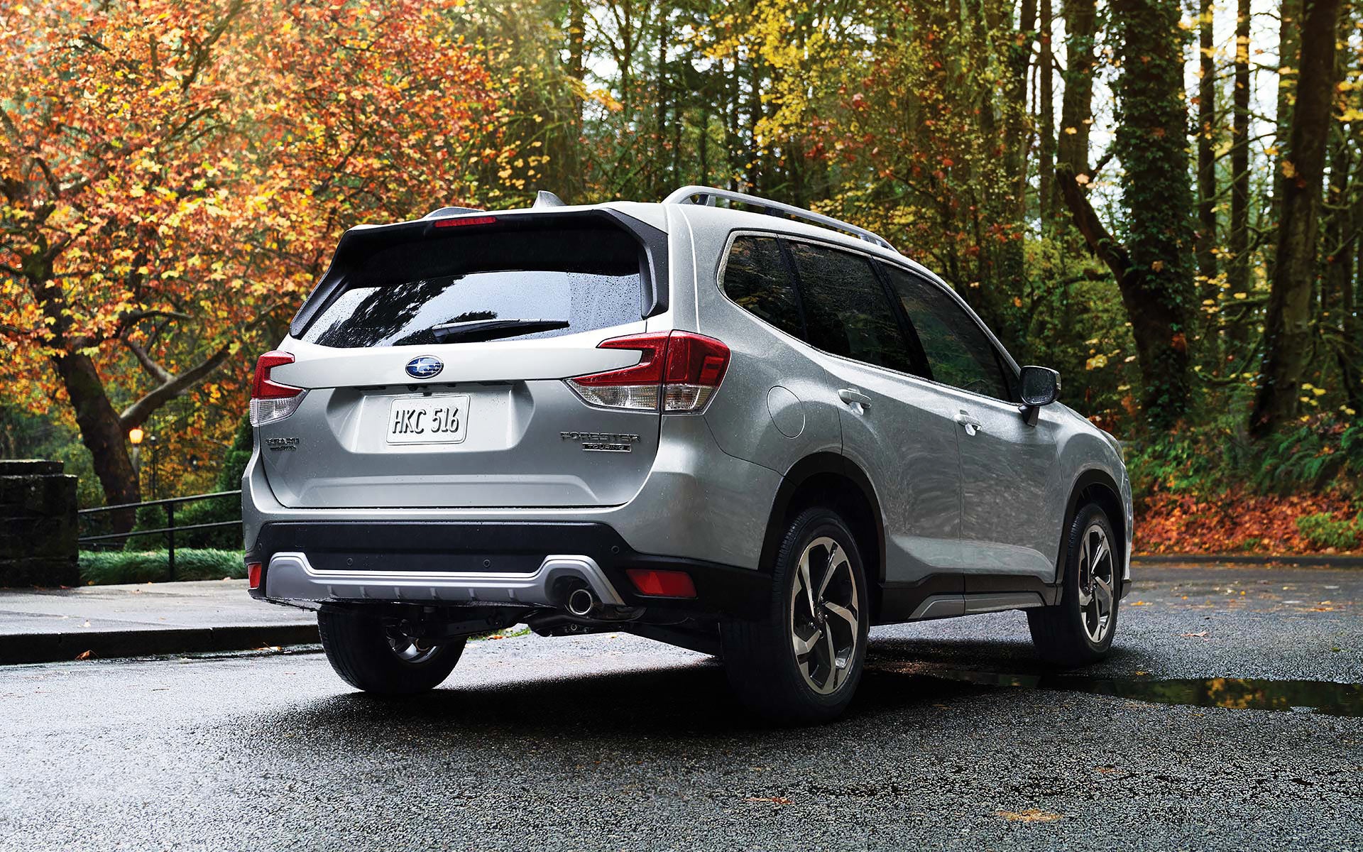The rear of the 2022 Forester on a neighborhood street. | Fuccillo Subaru in Watertown NY