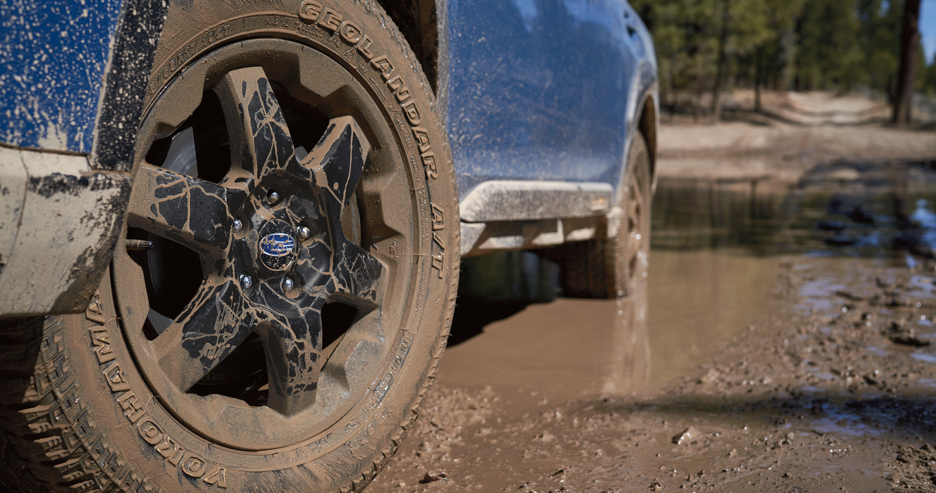 A close-up of the 17-inch off-road wheels and all-terrain Yokohama GEOLANDAR® tires on the 2023 Outback Wilderness. | Fuccillo Subaru in Watertown NY